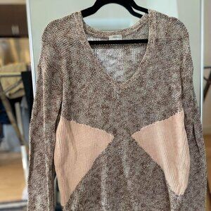 Wallace open-knit sweater in soft neutral brown and beige tones.